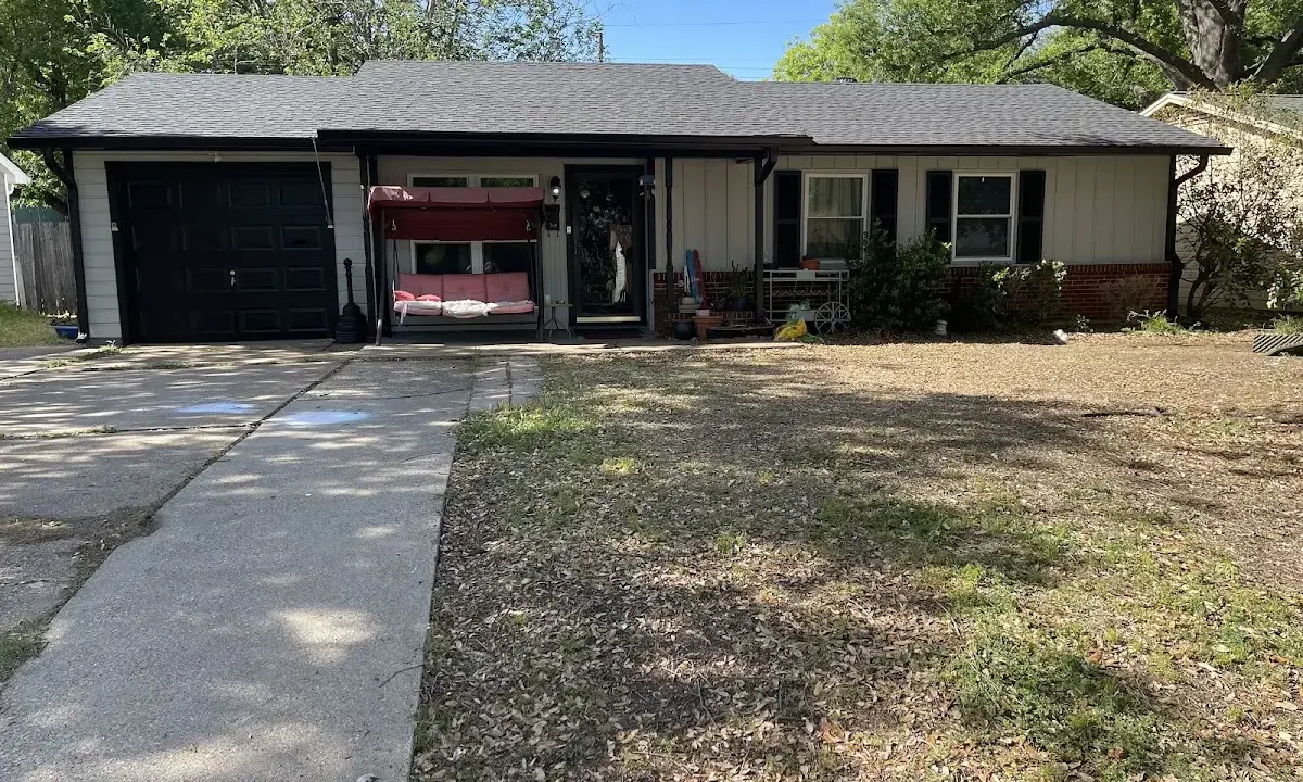 Hail Damage Roof Repair crew at work on a residential roof in Fleming Island